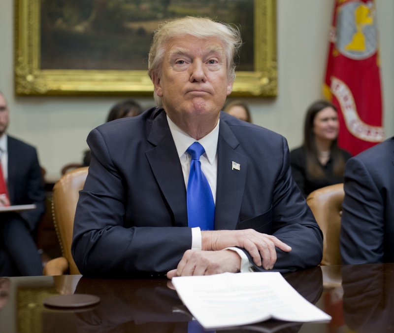 President Donald Trump pauses during a meeting in the Roosevelt Room of the White House in Washington, Wednesday, Feb. 1, 2017.