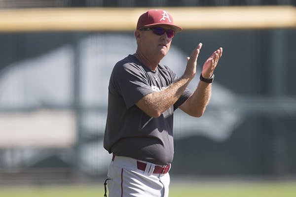 Arkansas coach Dave Van Horn encourages players during a practice Monday, Oct. 17, 2016, at Baum Stadium in Fayetteville. 