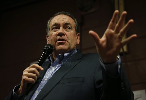 Former Republican presidential candidate and former Arkansas Gov. Mike Huckabee speaks at Inspired Grounds Cafe, Sunday, Jan. 31, 2016, in West Des Moines, Iowa. 
