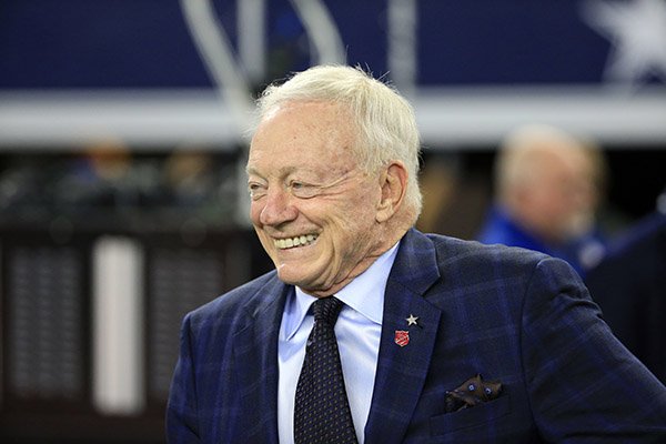 In this Dec. 18, 2016, file photo, Dallas Cowboys team owner Jerry Jones smiles as he walks onto the field during warmups before an NFL football game against the Tampa Bay Buccaneers in Arlington, Texas. (AP Photo/Ron Jenkins, File)

