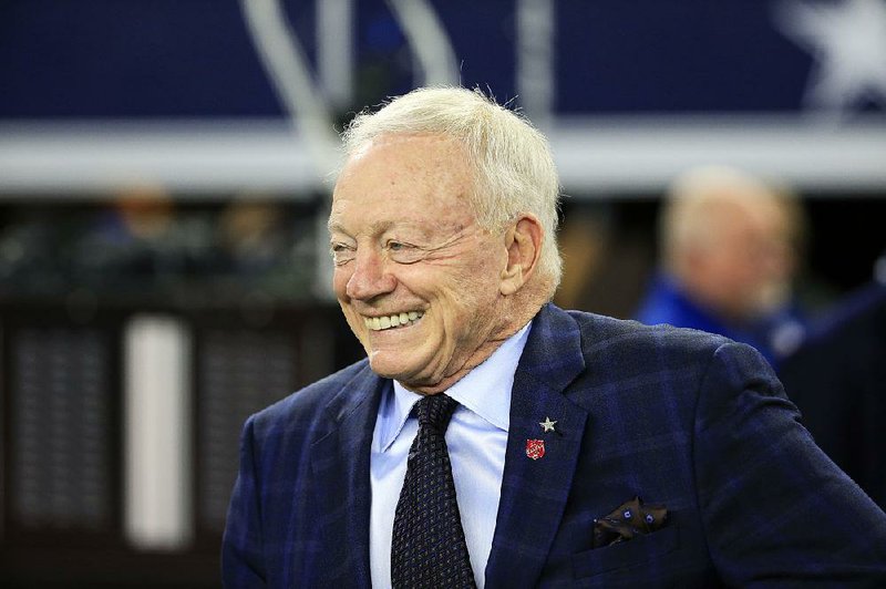 FILE - In this Dec. 18, 2016, file photo, Dallas Cowboys team owner Jerry Jones smiles as he walks onto the field during warmups before an NFL football game against the Tampa Bay Buccaneers in Arlington, Texas. Jones is on the ballot for the Pro Football Hall of Fame. (AP Photo/Ron Jenkins, File)