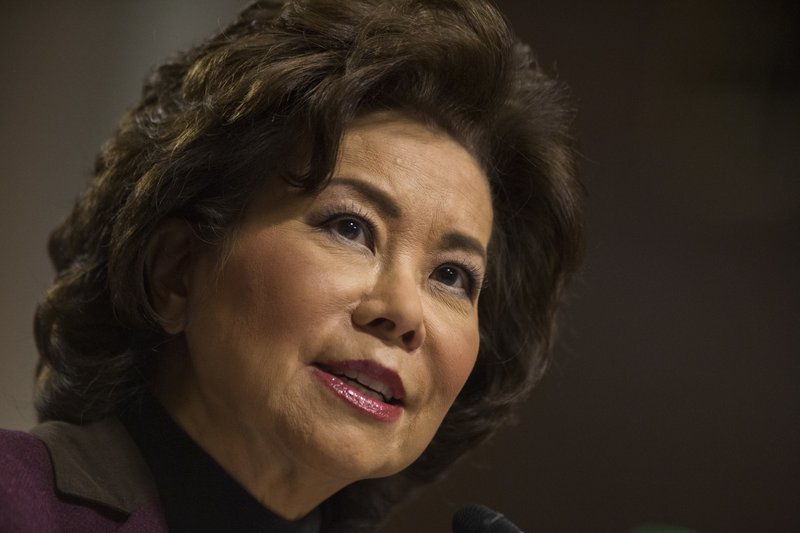 FILE- In this Wednesday, Jan. 11, 2017 file photo, transportation Secretary-designate Elaine Chao testifies on Capitol Hill in Washington, at her confirmation hearing before the Senate Commerce, Science, and Transportation Committee. 