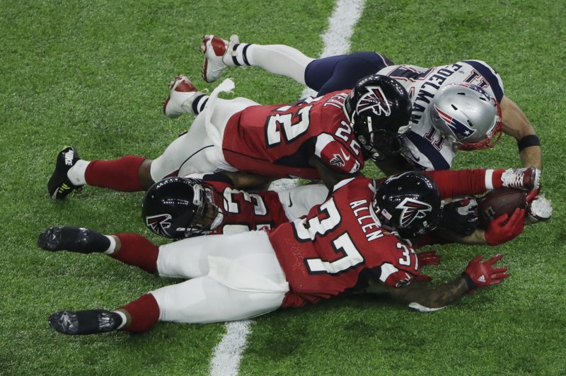 New England Patriots Julian Edelman runs after catching a pass