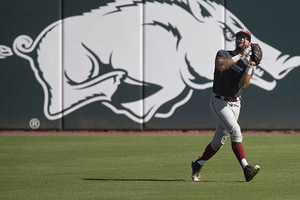 Arkansas outfielder Luke Bonfield makes a catch during a scrimmage Monday, Oct. 17, 2016, in Fayetteville. 