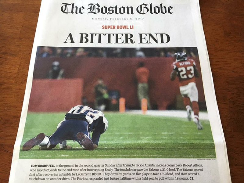 Early editions of Monday’s Boston Globe suggested that the New England Patriots lost Super Bowl LI to
the Atlanta Falcons. The city edition had the headline “Win for the ages” with Tom Brady holding the Vince Lombardi Trophy.