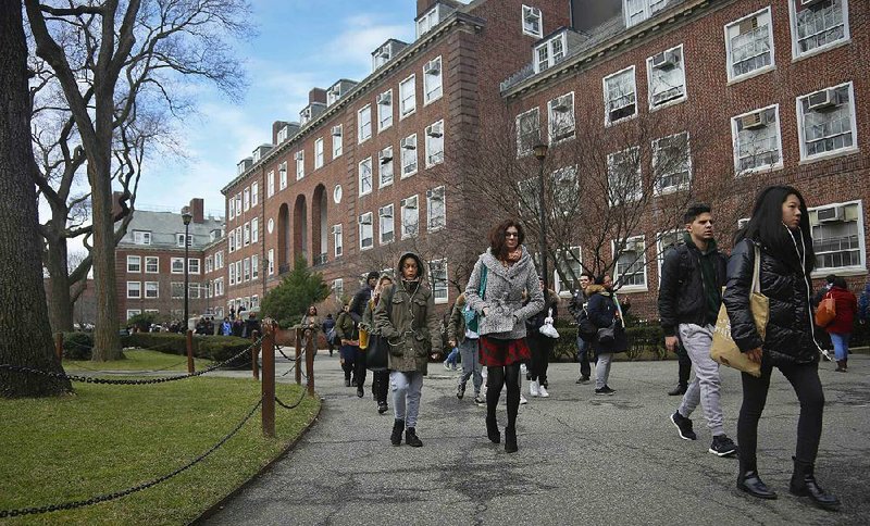 Brooklyn College students walk through the campus in New York last week.
