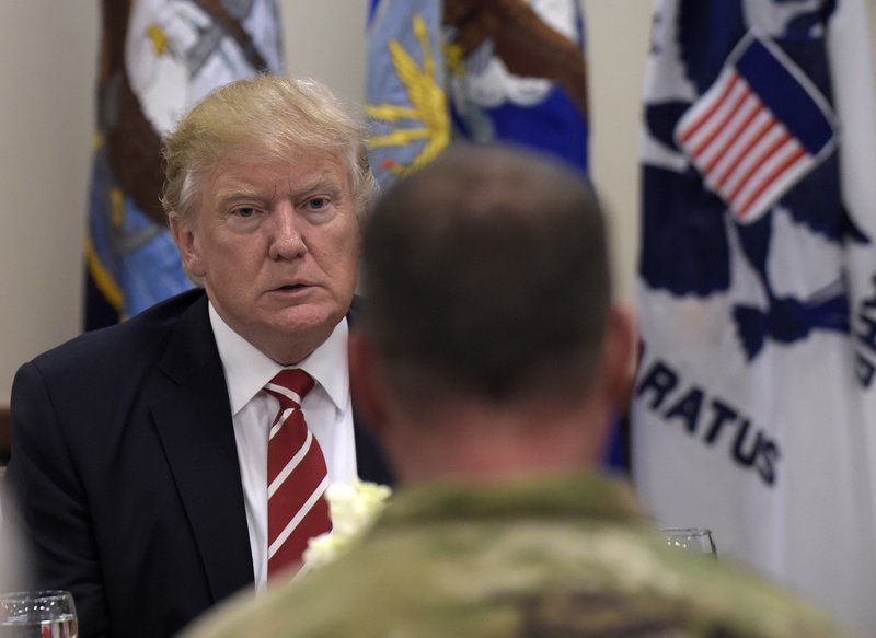 President Donald Trump has lunch with troops while visiting U.S. Central Command and U.S. Special Operations Command at MacDill Air Force Base, Fla., Monday, Feb. 6, 2017. Trump, who spent the weekend at Mar-a-Lago, stopped for a visit to the headquarters before returning to Washington. 