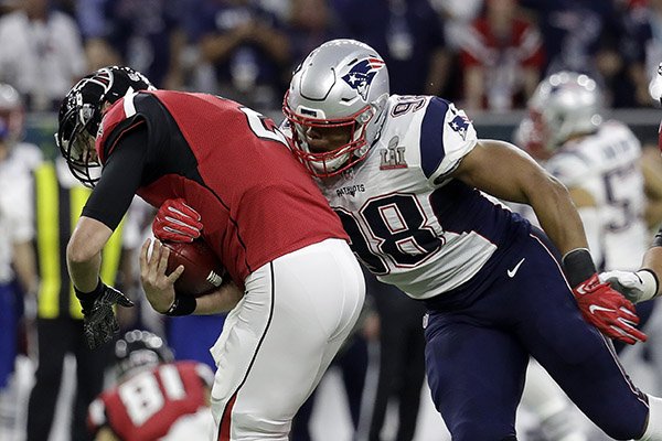 Atlanta Falcons' Matt Ryan is sacked by New England Patriots' Trey Flowers during the first half of the NFL Super Bowl 51 football game Sunday, Feb. 5, 2017, in Houston. (AP Photo/Eric Gay)

