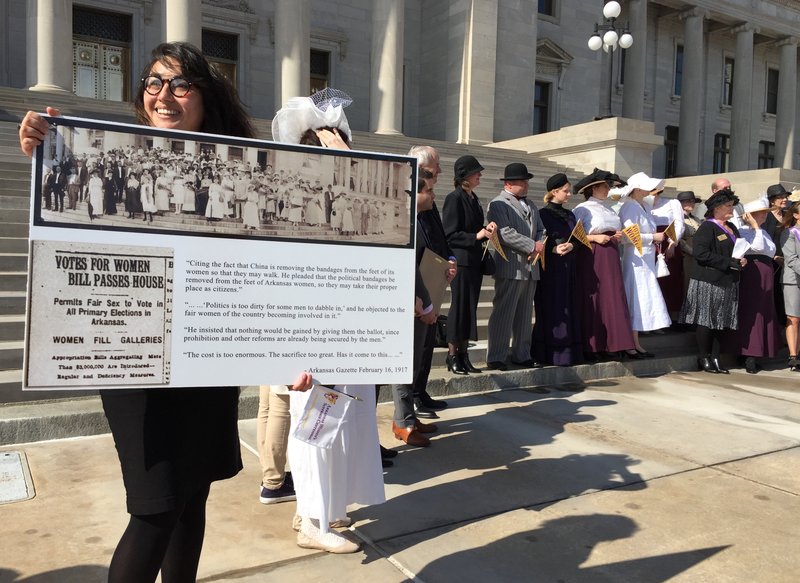 State officials stood on Capitol steps Tuesday to celebrate the centennial anniversary of Arkansas women gaining the right to vote in state primaries.