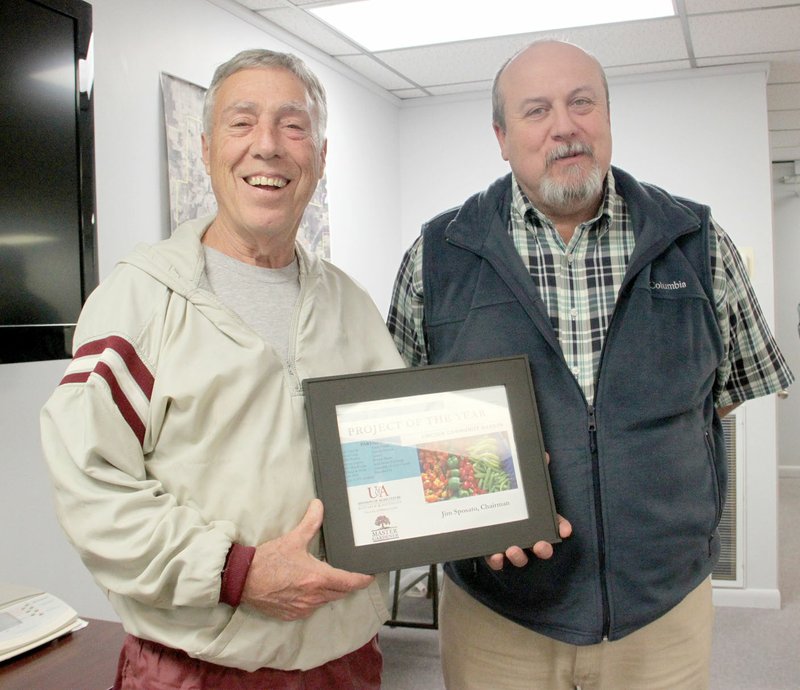 LYNN KUTTER ENTERPRISE-LEADER Lincoln&#8217;s community garden was named the 2016 Washington County Master Garden Project of the Year, as shown by Jim Sposato, left, and Lincoln Mayor Rob Hulse was named 2016 Friend of Washington County Master Gardeners. Sposato, a retired teacher and coach for Lincoln Consolidated School District, oversees the community garden.