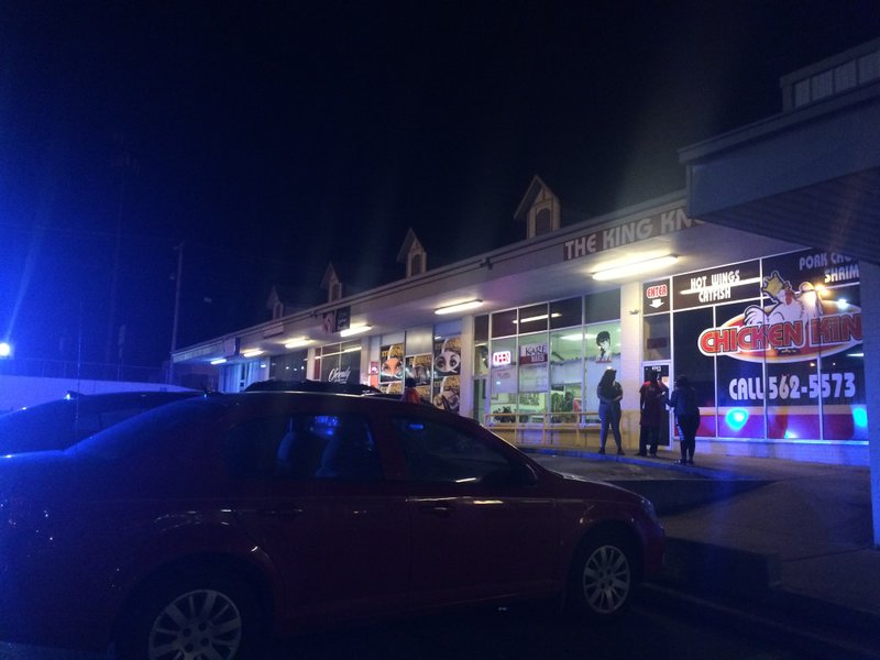 Police investigate at a Little Rock strip mall after a 13-year-old was grazed by a bullet Tuesday night.