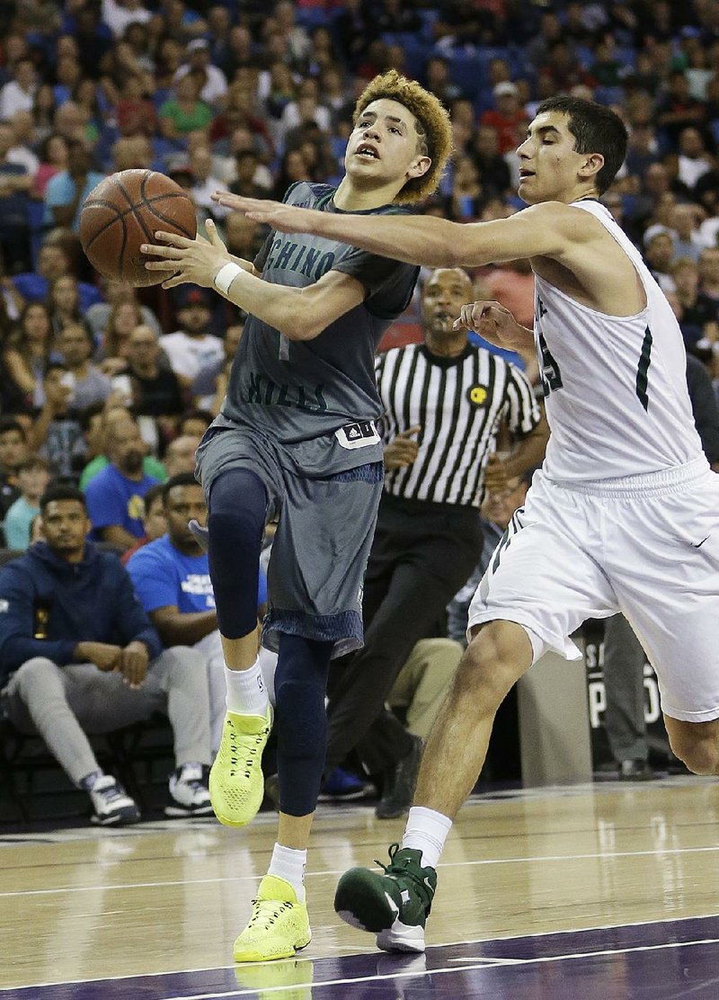 LaMelo Ball (left), a sophomore at Chino Hills (Calif.) High School, made 37 of 61 shots from the floor — including 7 of 22 three-pointers — and hit 11 of 14 free throws to finish with 92 points in a 146-123 victory over Los Osos, Calif., on Tuesday night. 