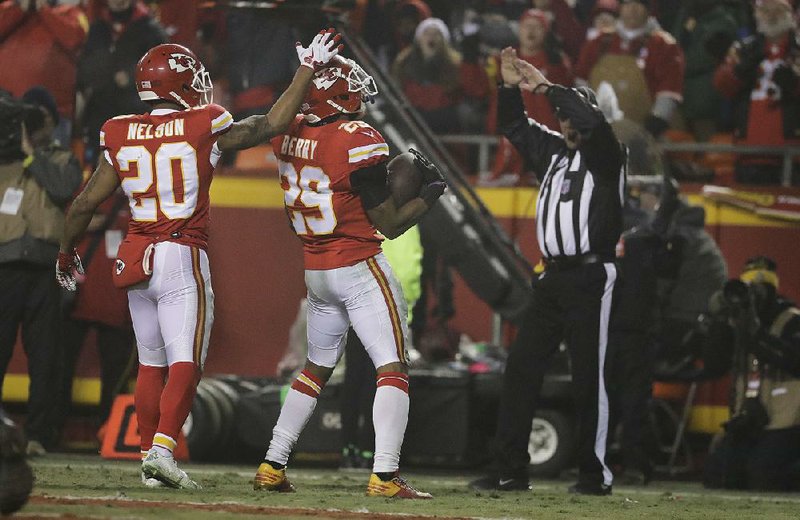 Kansas City strong safety Eric Berry (middle) is congratulated by teammate Steven Nelson after an interception during the Chiefs’ loss to the Pittsburgh Steelers in the AFC divisional playoffs. Berry played last season under the franchise tag and said last week he would not do it again, meaning the Chiefs may have to pay handsomely to sign him to a long-term deal.  