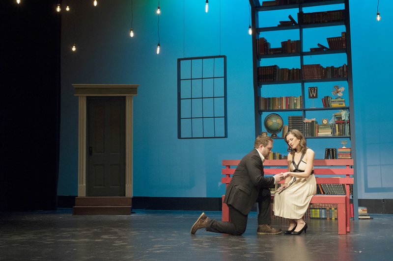 Bryce Kemph as Jamie proposes to Elizabeth Crouch Jilka as Cathy in “The Last Five Years,” a musical written by Jason Robert Brown on stage at the Arts Center of the Ozarks in Springdale.