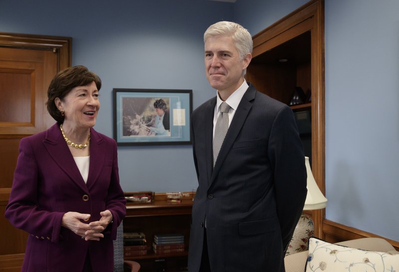 Supreme Court Justice nominee Neil Gorsuch meets with Senate Judiciary Committee member Sen. Susan Collins, R-Maine on Capitol Hill in Washington, Thursday, Feb. 9, 2017. The committee will oversee Gorsuch's confirmation hearing. (AP Photo/J. Scott Applewhite)