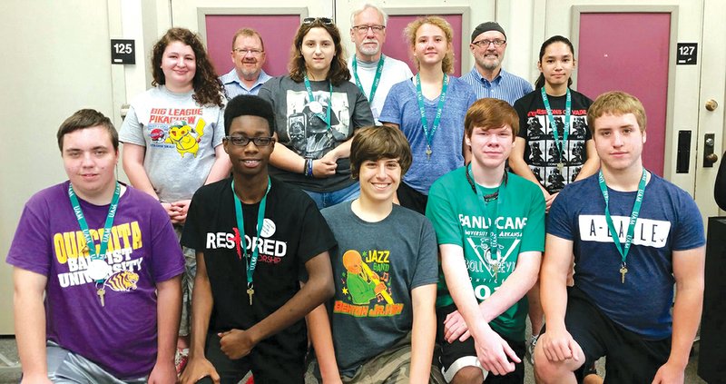 2016 Hot Springs Jazz Society summer-camp participants pose with the professors who worked with them at the University of Arkansas at Monticello. In the front row, from left, are Tyler Harrington of Sheridan High School, Jeffery Masby of Central High School in Little Rock, Mason Rhodes of Benton High School, Dylan Miller of Heber Springs High School and Caleb Lea of Benton High School. In the middle row are Emma Darnell of Bismarck High School, Rachel Diggs of Cutter Morning Star High School, Anna Cole of Lake Hamilton High School in Hot Springs and Isaias Filipek of Bismarck High School. In the back row are professors Don Marshan, Claude Askew and Gary Meggs.