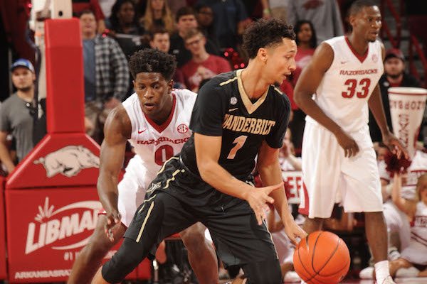 Vanderbilt guard Payton Willis (1) makes a move to avoid Arkansas guard Jaylen Barford (0) Tuesday, Feb. 7, 2017, during the first half of play in Bud Walton Arena in Fayetteville.