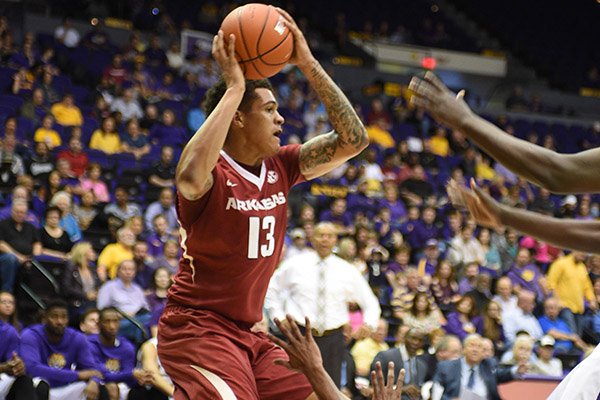 Arkansas' Dustin Thomas rebounds the basketball during a game against LSU on Saturday, Feb. 11, 2017, in Baton Rouge, La. 