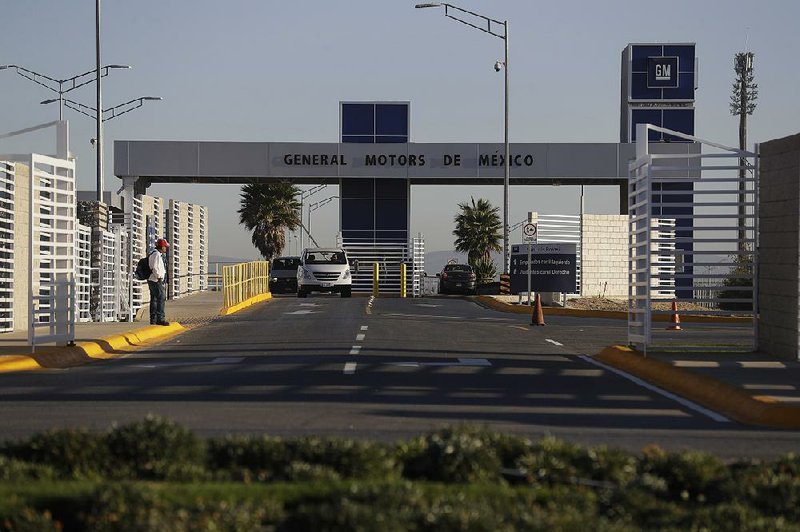 Cars leave the General Motors assembly plant in Villa de Reyes, Mexico, last month. Automakers have joined with retailers to oppose a tax on goods imported to the United States.