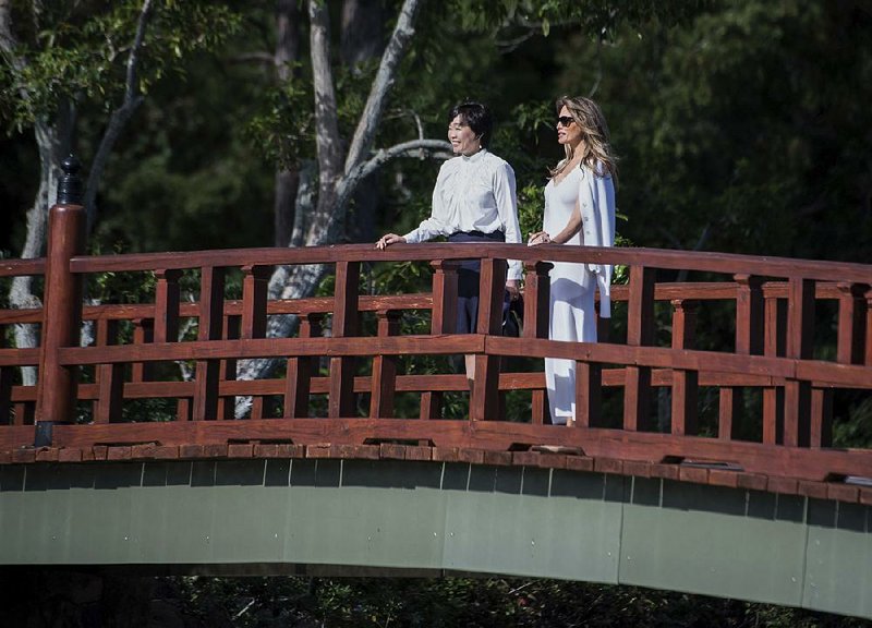 First lady Melania Trump and Akie Abe, wife of Japanese Prime Minister Shinzo Abe, tour the Morikami Museum and Japanese Gardens in Delray Beach, Fla., on Saturday.