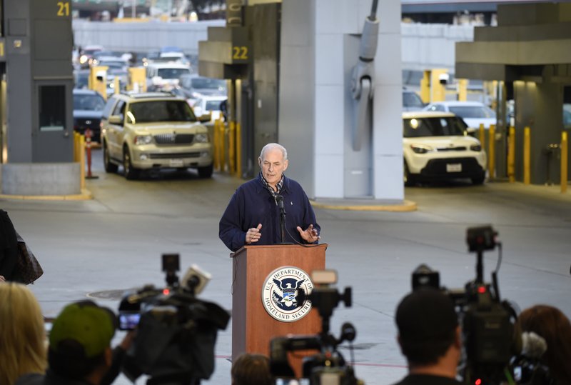 Secretary of Homeland Security John Kelly speaks at news conference as cars enter the United States from Mexico at the San Ysidro Port of Entry, Friday, Feb. 10, 2017, in San Diego. (AP Photo/Denis Poroy)