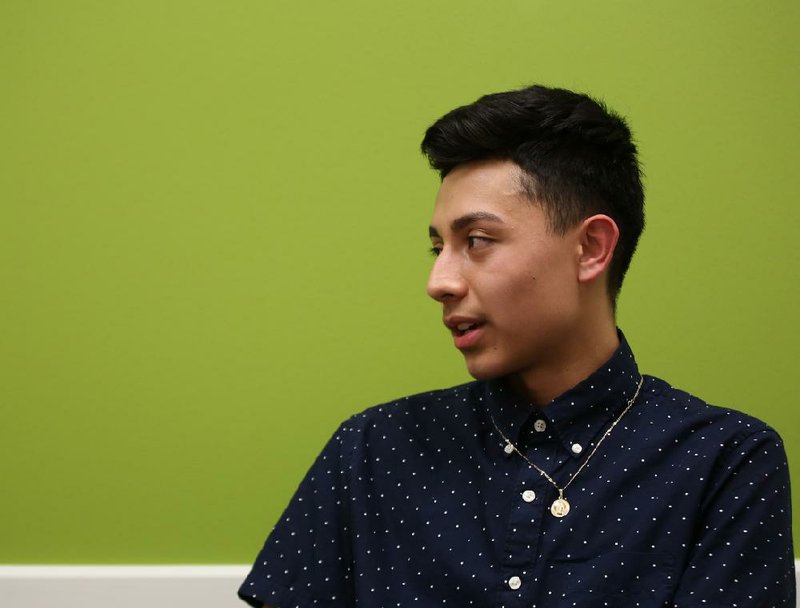 Jesus Fabian, a 17-year-old Parkview Arts and Science Magnet High School student, talks about his experience with Deferred Action for Childhood Arrivals and immigration at the Dee Brown Library in Little Rock on Saturday.