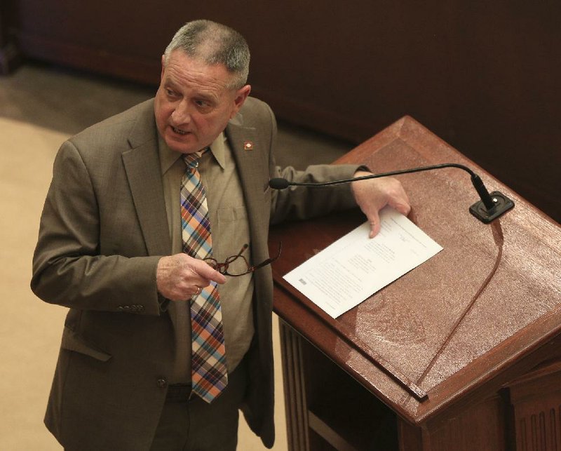 Rep. Douglas House asks a question Monday on the House floor before presenting a pair of bills, House Bill 1371 and House Bill 1298, concerning the ownership and licensing of medical marijuana dispensaries and cultivation facilities.