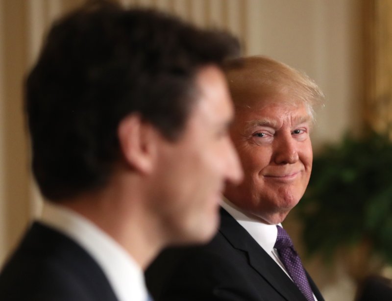 President Donald Trump smiles during a joint news conference with Canadian Prime Minister Justin Trudeau in the East Room of the White House in Washington, Monday, Feb. 13, 2017. 