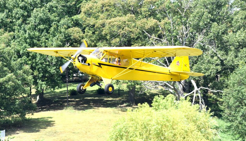 Photo by Mike Eckels One of the most iconic aircraft of the 1940s, a Piper Cub, performed a series of touch and go landings at Crystal Lake Airport on Aug. 16, 2016. Governor Asa Hutchinson proclaimed the month of February &#8220;General Aviation Appreciation Month&#8221; in Arkansas.