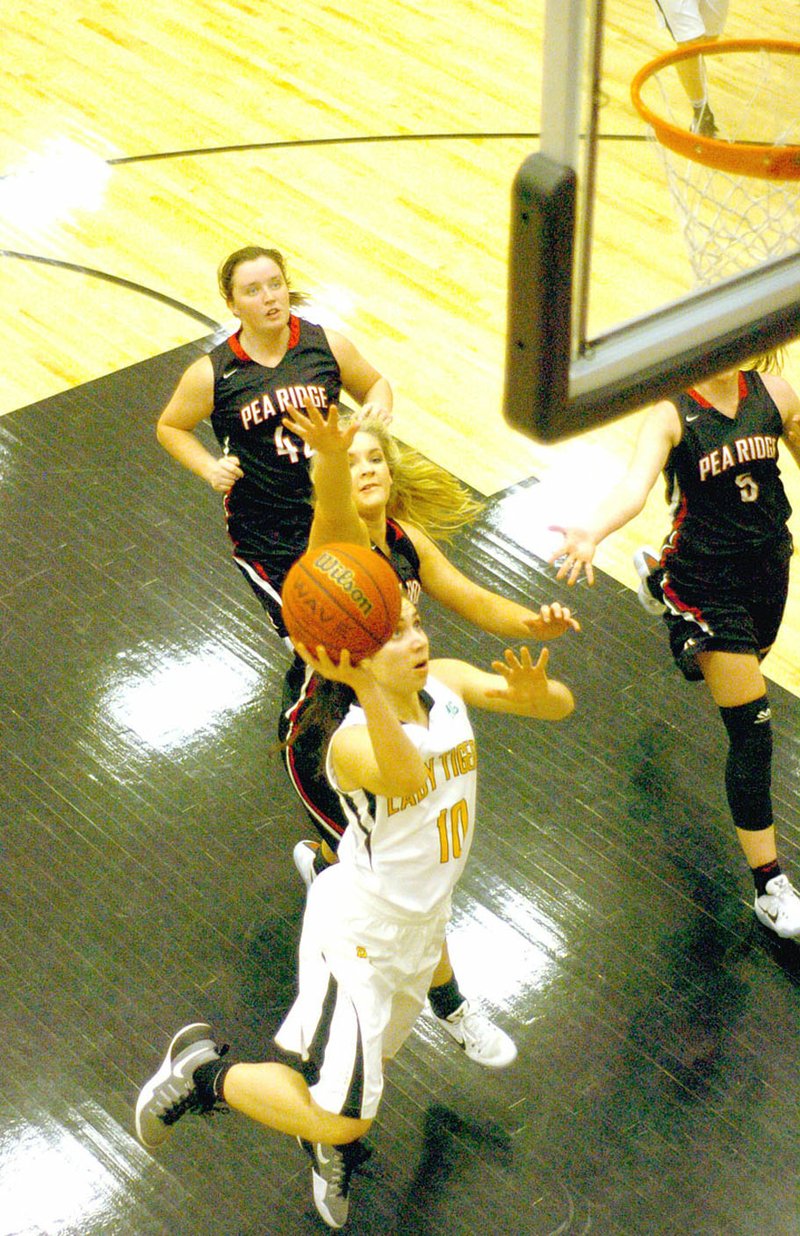 Photo by Mark Humphrey/Enterprise-Leader/Prairie Grove sophomore Lexie Madewell goes up for a layup against Pea Ridge. The Lady Tigers lost at home, 62-47, to Pea Ridge on Feb. 7.