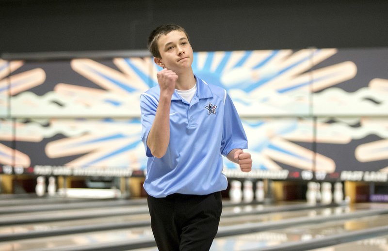 NWA Democrat-Gazette/JASON IVESTER Fort Smith Southside freshman Colby Harger celebrates Tuesday after bowling a 255 during the 7A-6A state tournament at Fast Lane Entertainment in Lowell.
