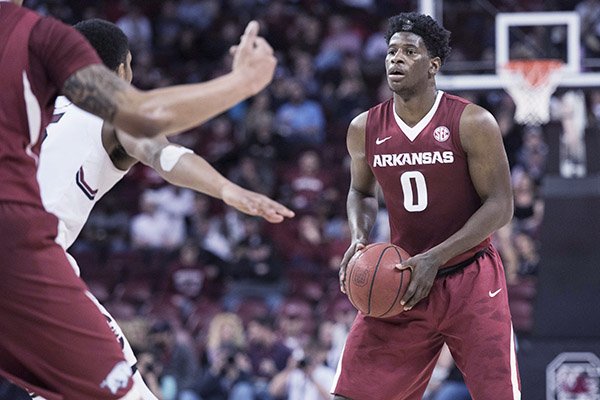 Arkansas guard Jaylen Barford (0) looks for an open teammate during the second half of an NCAA college basketball game against South Carolina, Wednesday, Feb. 15, 2017, in Columbia, S.C. Arkansas defeated South Carolina 83-76. (AP Photo/Sean Rayford)

