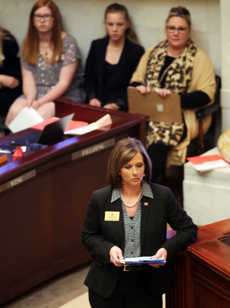 Rep. Sarah Capp presents her bill Wednesday to allow direct shipments of wine from small-farm wineries to Arkansans who haven’t visited the wineries.
