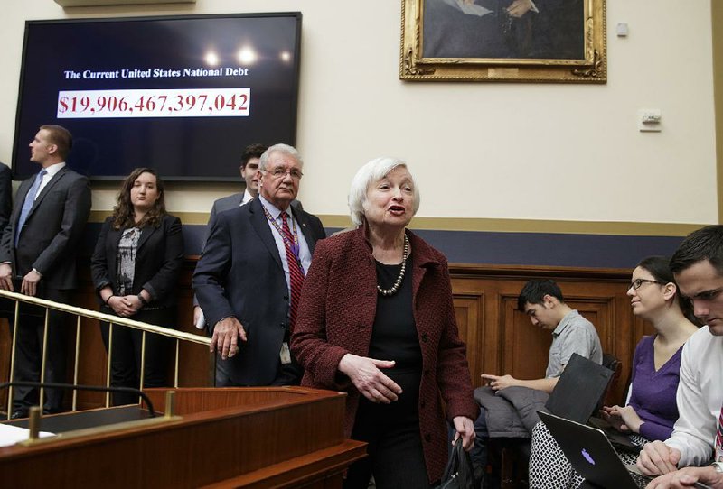 Federal Reserve Chairman Janet Yellen arrives Wednesday on Capitol Hill in Washington to testify before the House Financial Services Committee. 