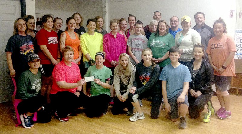 Sally Carroll/McDonald County Press Members of the CWR Fitness Class are launching a new scholarship at McDonald County High School with a $350 donation that will benefit students needing food, funds for club attire and monetary help for additional ACT test registrations.