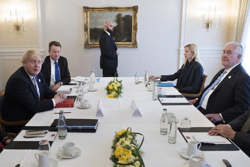 Britain's Foreign Secretary Boris Johnson, left, and U.S. Secretary of State Rex Tillerson, right, meet at the Steigenberger Hotel on Thursday, Feb. 16, 2017, in Bad Neuenahr, near Bonn, Germany.