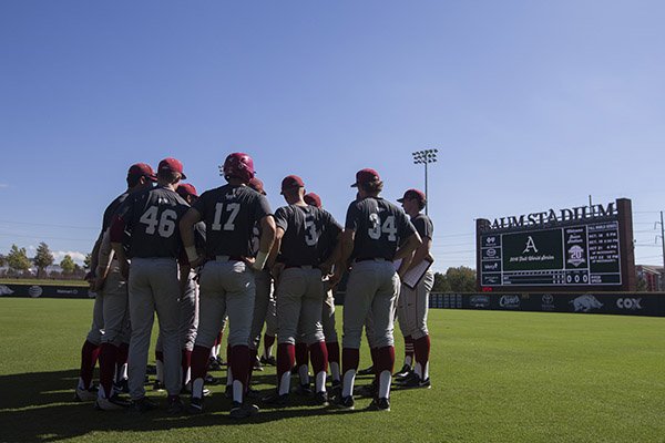 Arkansas players huddle before a practice Monday, Oct. 17, 2016, in Fayetteville. 