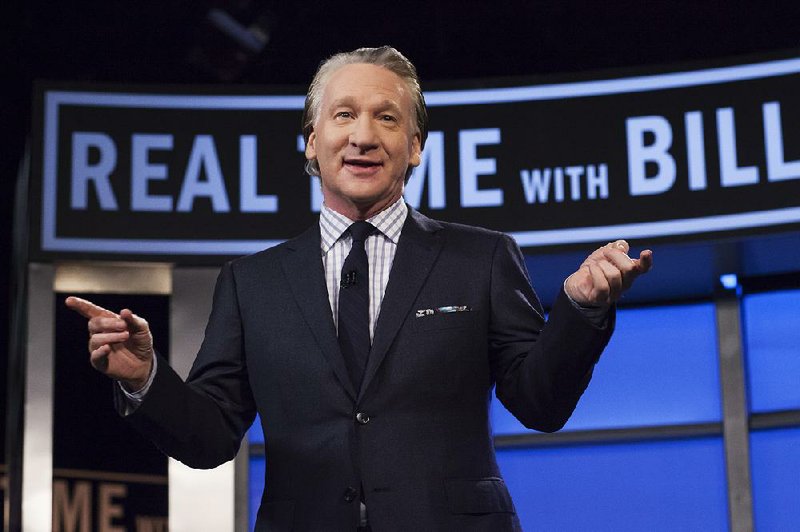 This April 8, 2016 photo released by HBO shows Bill Maher, host of "Real Time with Bill Maher," during a broadcast of the show in Los Angeles. 