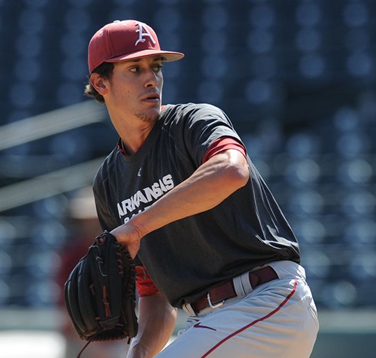NWA Democrat-Gazette/Andy Shupe ON THE HILL: Blaine Knight, pictured loosening up last fall, is Arkansas coach Dave Van Horn's choice as starting pitcher in the Razorbacks' season opener today against Miami, Ohio. Single games are scheduled at 3 p.m. today, noon Saturday and 1 p.m. Sunday at Baum Stadium in Fayetteville.