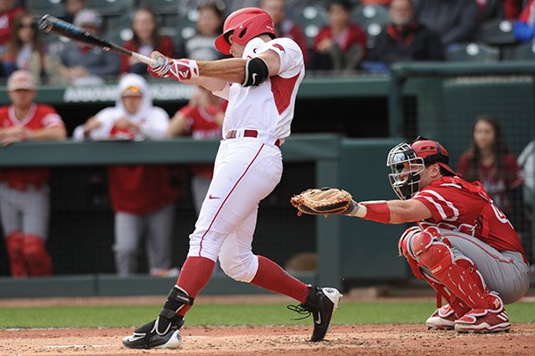 Arkansas left fielder Luke Bonfield connects against Miami (Ohio) Friday, Feb. 17, 2017, during the first inning at Baum Stadium in Fayetteville.