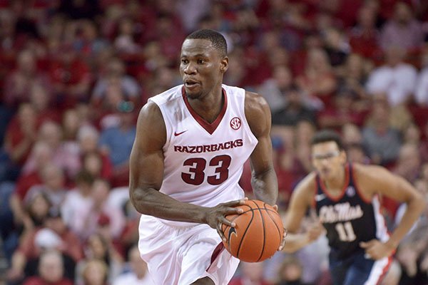 Arkansas center Moses Kingsley dribbles down the floor against Ole Miss in the first half Saturday, Feb. 18, 2017, during the game at Bud Walton Arena in Fayetteville.