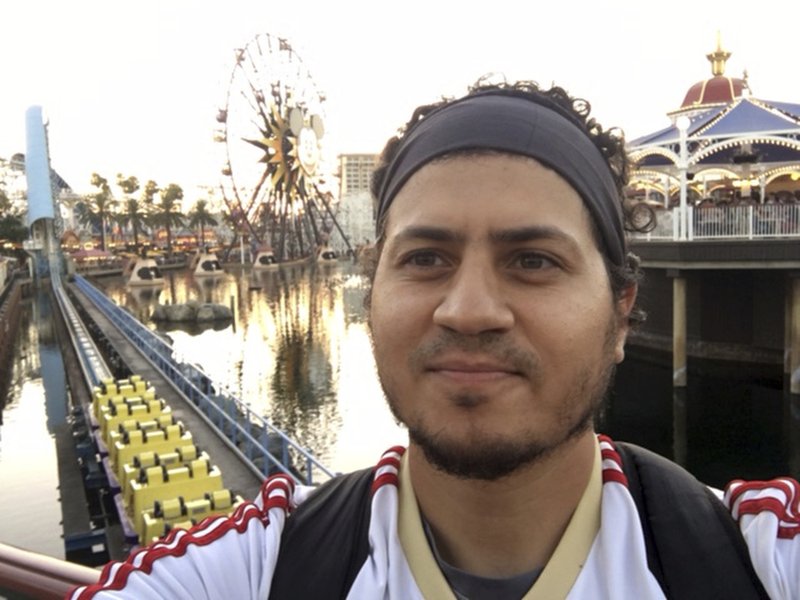  This Aug. 2016 photo provided by Haisam Elsharkawi, shows Haisam Elsharkawi, a self-employed businessman from Anaheim, Calif., poses for a selfie at Disneyland. Elsharkawi says he was detained on Feb. 9, by U.S. Customs and Border Protection at Los Angeles International Airport while he tried to board a flight to Saudi Arabia because he refused to unlock his cell phone. 