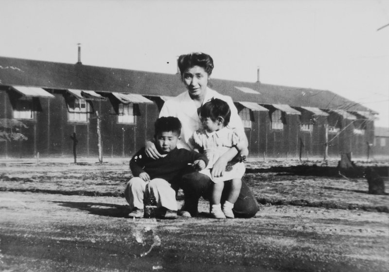 This 1945 photo provided by the family shows Shizuko Ina, with her son, Kiyoshi, left, and daughter, Satsuki, in a prison camp in Tule Lake, Calif. This photo was made by a family friend who was a soldier at the time, since cameras were considered contraband at the camp. Satsuki was born at the camp. 