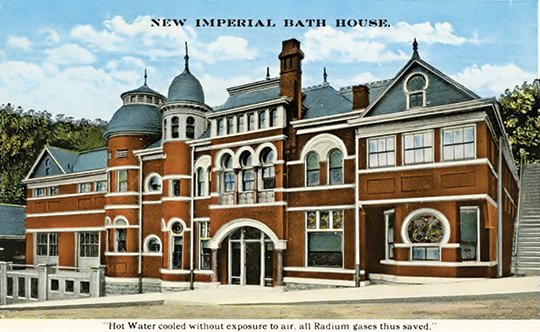 Submitted photo PICTURESQUE HSNP: This vintage postcard shows the New Imperial Bath House on Reserve Street. The bath house opened in 1912 and was razed in 1937 to make room for the Grand Promenade entrance on Reserve. Mary Bell Hill will present "Images of Hot Springs National Park" at the Garland County Historical Society meeting at noon Tuesday at Garland County Library.