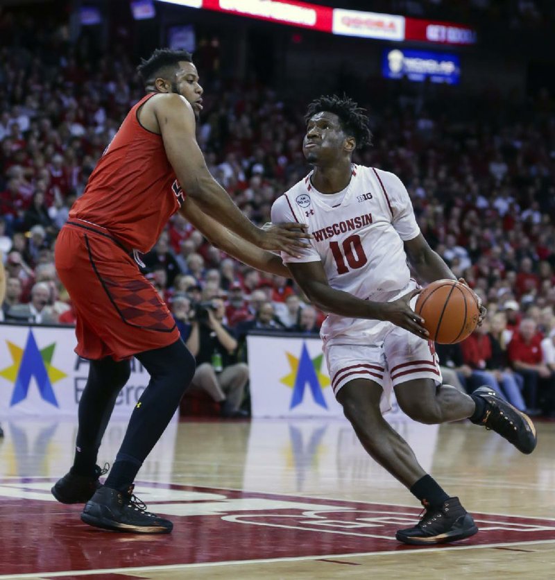 Wisconsin forward Nigel Hayes (right) scored a team-high 21 points, including 14 in the second half, to help the No. 11 Badgers snap a two-game losing streak with a 71-60 victory over No. 23 Maryland on Sunday.