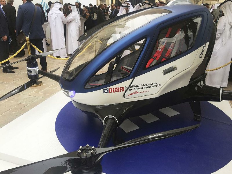 A model of the EHang 184 is seen last week at the World Government Summit in Dubai, United Arab Emirates. Plans in Dubai are for regular fl ights of the passenger-carrying drone by July.
