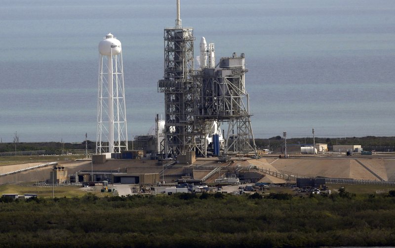 A Space X Falcon9 rocket sits on the launch pad, Saturday, Feb. 18, 2017 at the Kennedy Space Center in Cape Canaveral, Fla  Last-minute rocket trouble forced SpaceX on Saturday to delay its inaugural launch from NASA's historic moon pad. SpaceX halted the countdown with just 13 seconds remaining. The problem with the second-stage thrust control actually cropped up several minutes earlier. With just a single second to get the Falcon rocket airborne, flight controllers could not resolve the issue in time. 