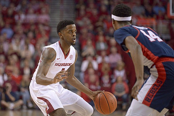 Arkansas guard Daryl Macon dribbles during a game against Ole Miss on Saturday, Feb. 18, 2017, in Fayetteville. 