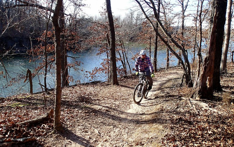 The soft-surface loop trail around Lake Fayetteville is ideal for riders new to mountain biking, but offers a nice time for experienced riders like Brannon Pack, executive director of the Ozark Off Road Cyclists.