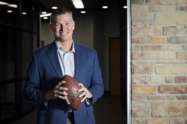 Sean Rochelle is photographed Tuesday, Feb. 14, 2017, at his office in Bentonville. Rochelle, a former quarterback at Arkansas-Monticello and executive director of the Razorback Foundation, was elected to the Arkansas Sports Hall of Fame. 